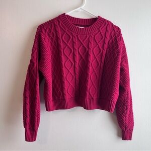 Cropped red cable knit sweater